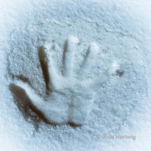 Handabdruck im Schnee